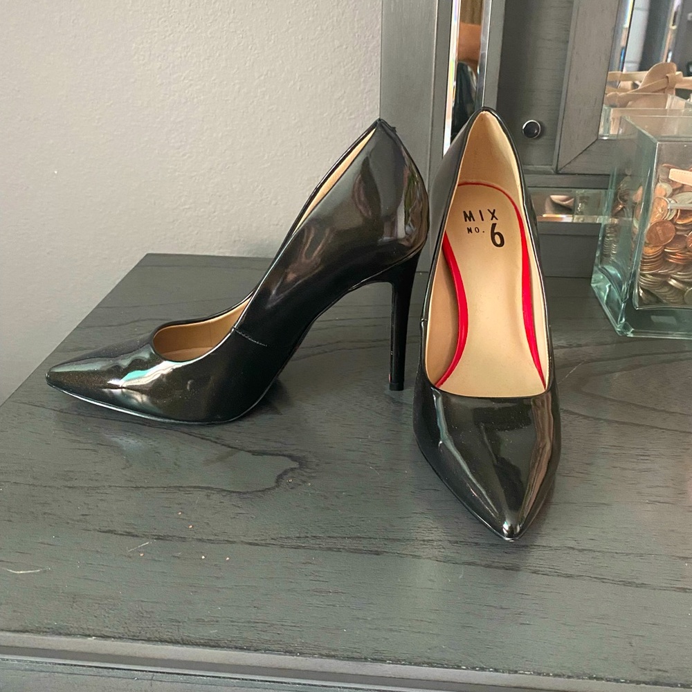 Black pointy toe heels, size 7.5